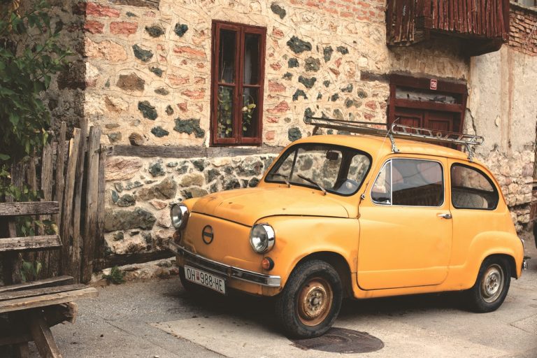 old yellow small car